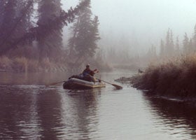Round boat on smaller Alaska river Float hunting a smaller Alaska river